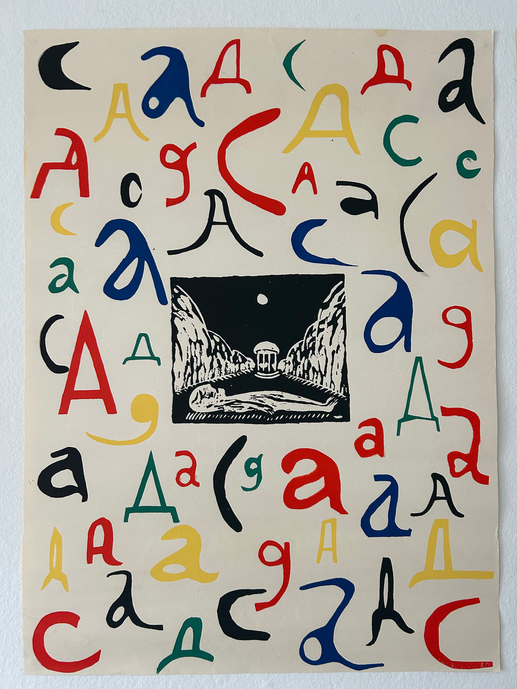 Poster with colorful abstract letter 'a' designs and a black and white central image on a beige background.