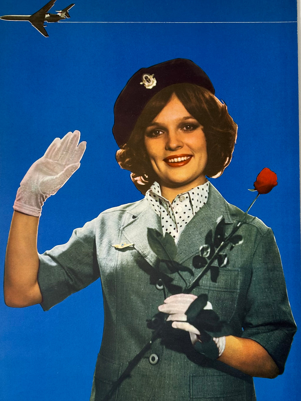 Vintage-style Soviet Airlines advertisement featuring a woman in a flight attendant uniform with a red rose against a blue background.