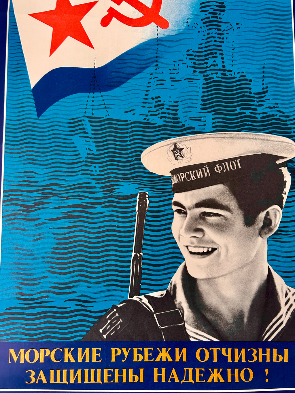 Soviet-style poster with a sailor and text on a blue background