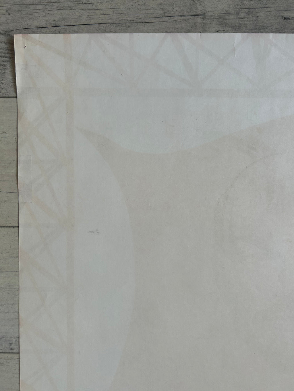 White  with subtle gray veining on a wooden surface