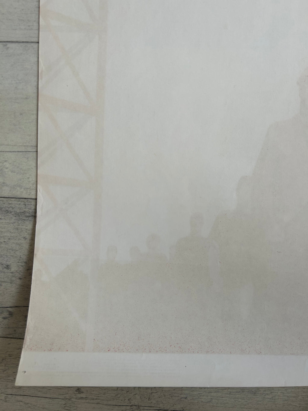 White sheet of paper on a wooden surface