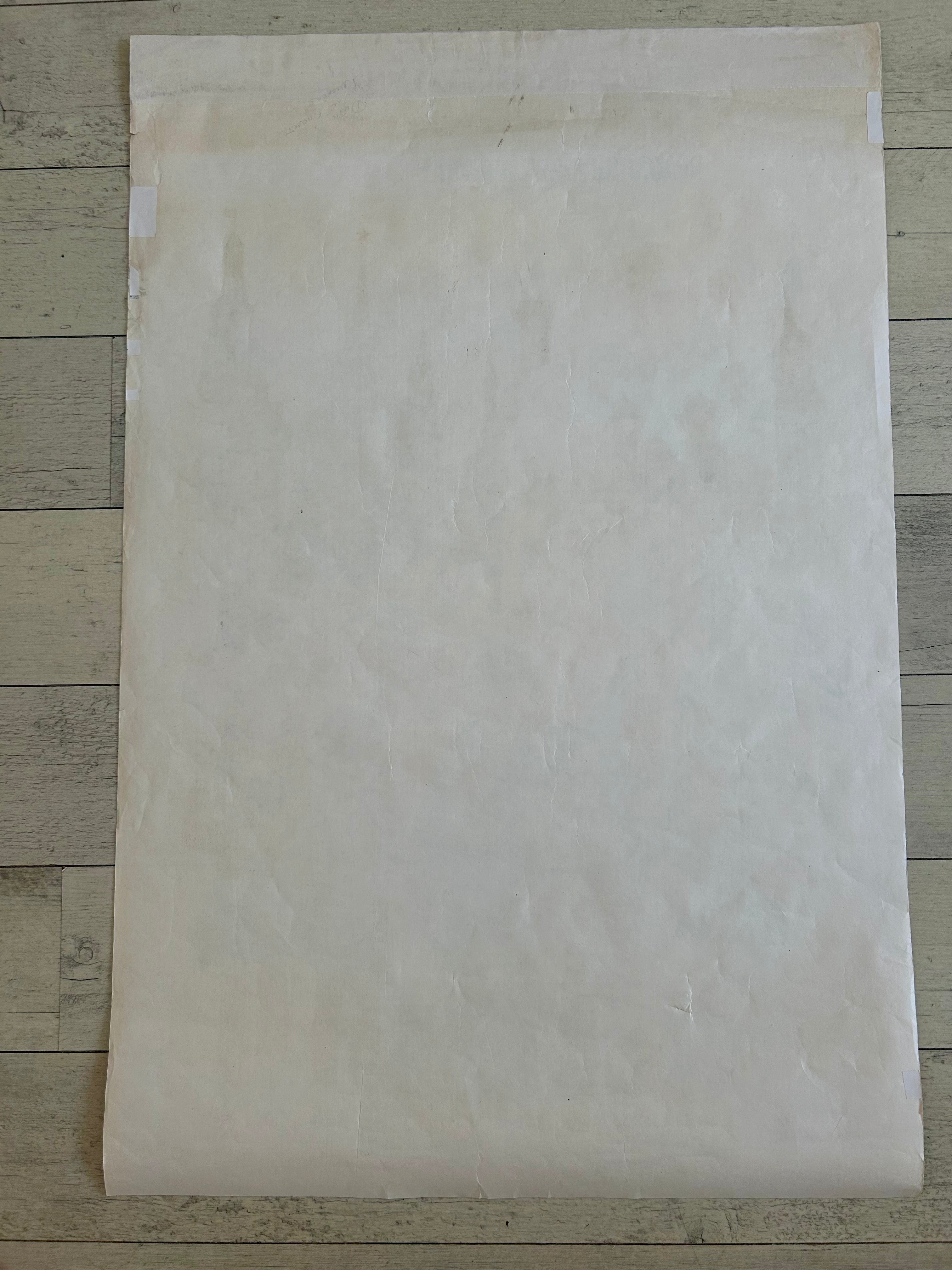 Beige paper sheet on a wooden surface