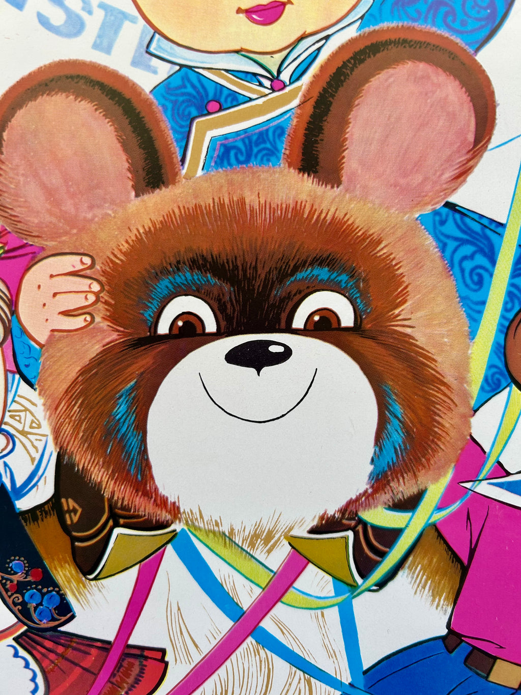 Cartoon bear character with colorful background