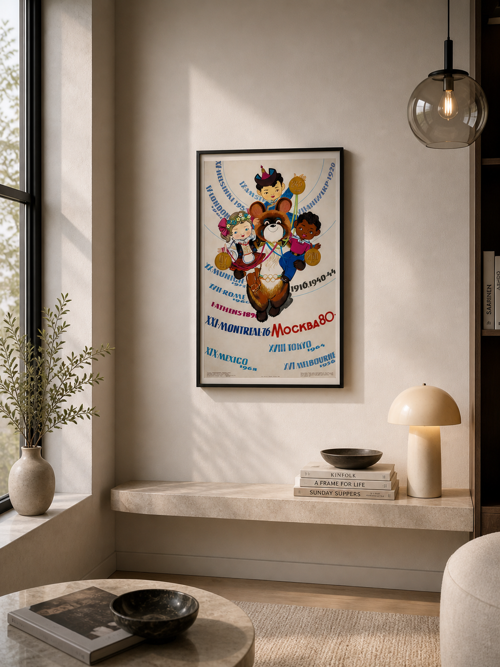 Framed artwork on a wall in a modern living room with decor elements.