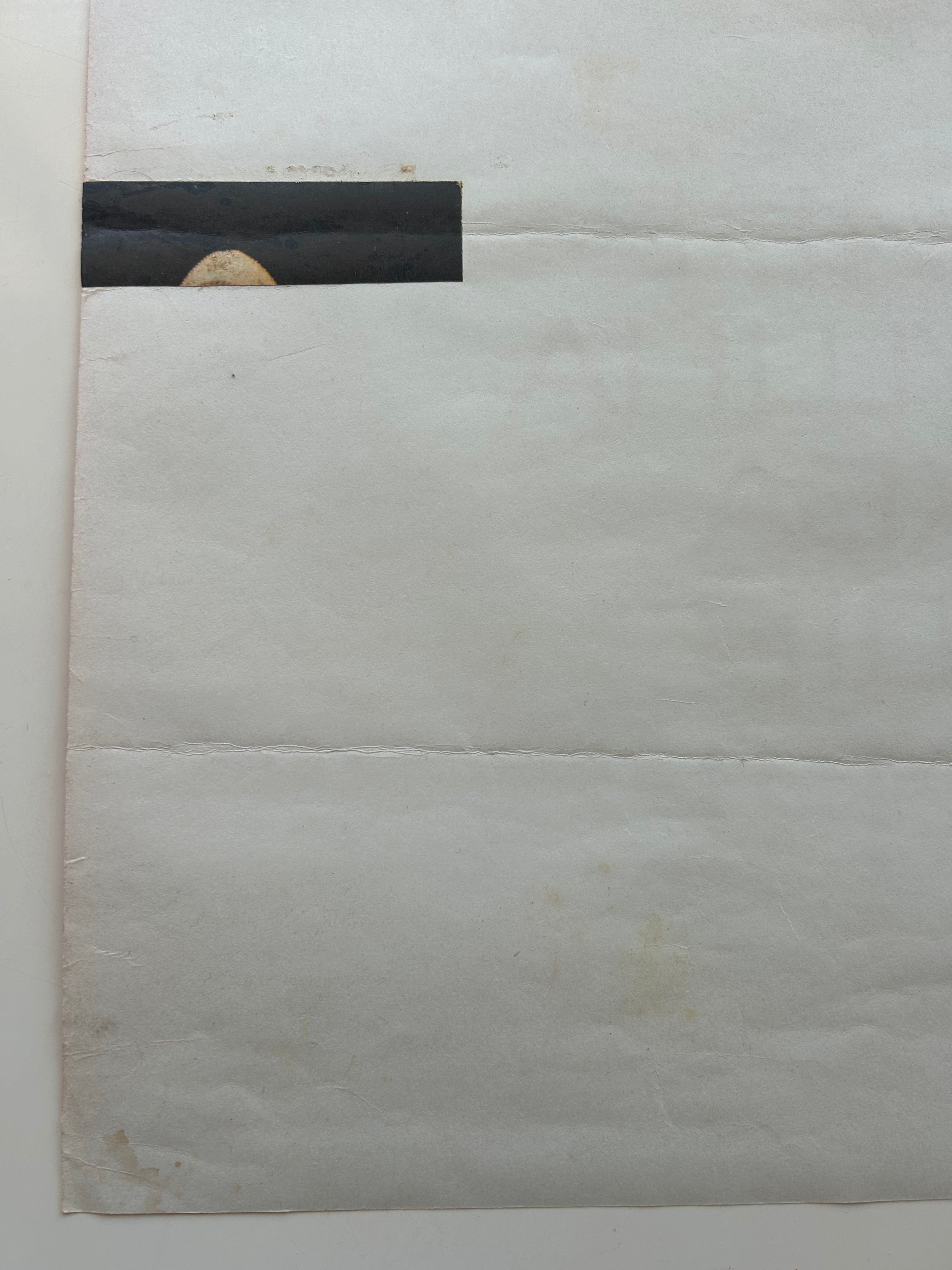 White marble surface with a black rectangular patch